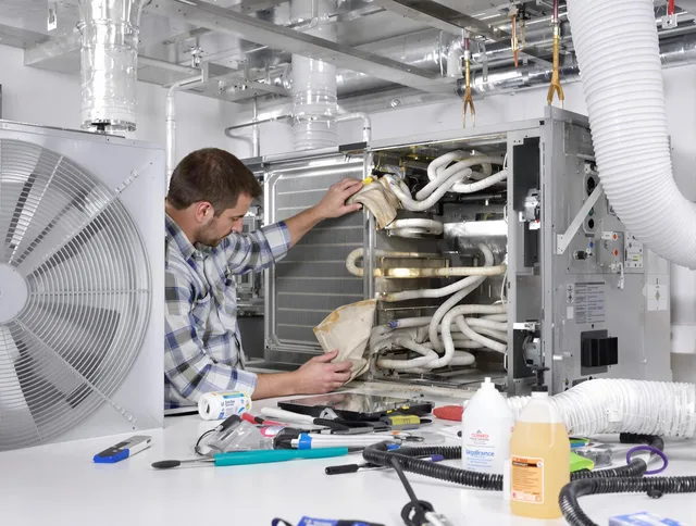Hull Air Duct Cleaning specialist performing precision AC coil cleaning in Hull