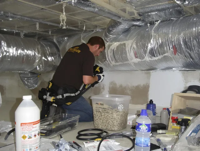Hull Air Duct Cleaning specialist performing professional mold removal from air ducts in Hull