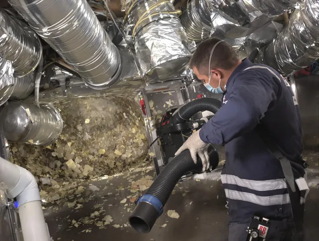 Hull Air Duct Cleaning specialist operating negative pressure cleaning equipment for thorough duct maintenance in Hull